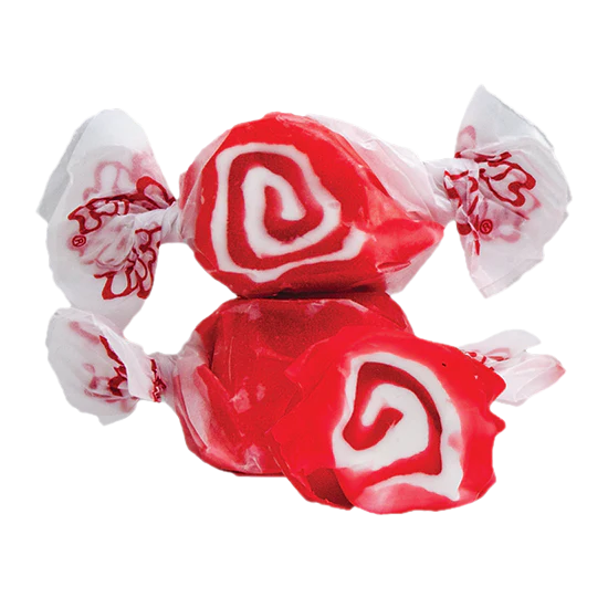 Two Red Licorice Salt Water Taffy – Freeze-Dried, Fruity & Crunchy Classic Candy pieces are wrapped in clear plastic with red designs; one is unwrapped to display its signature swirl—a treat for classic candy fans.