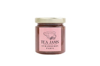 Thumbnail for A glass jar of gourmet tea-infused strawberry jam with a gold lid. The pink label reads Mini Tea Jams Gift Set – Handcrafted Jam Strawberry Paris, inspired by Harney & Sons teas, and features a teacup and strawberry illustration.