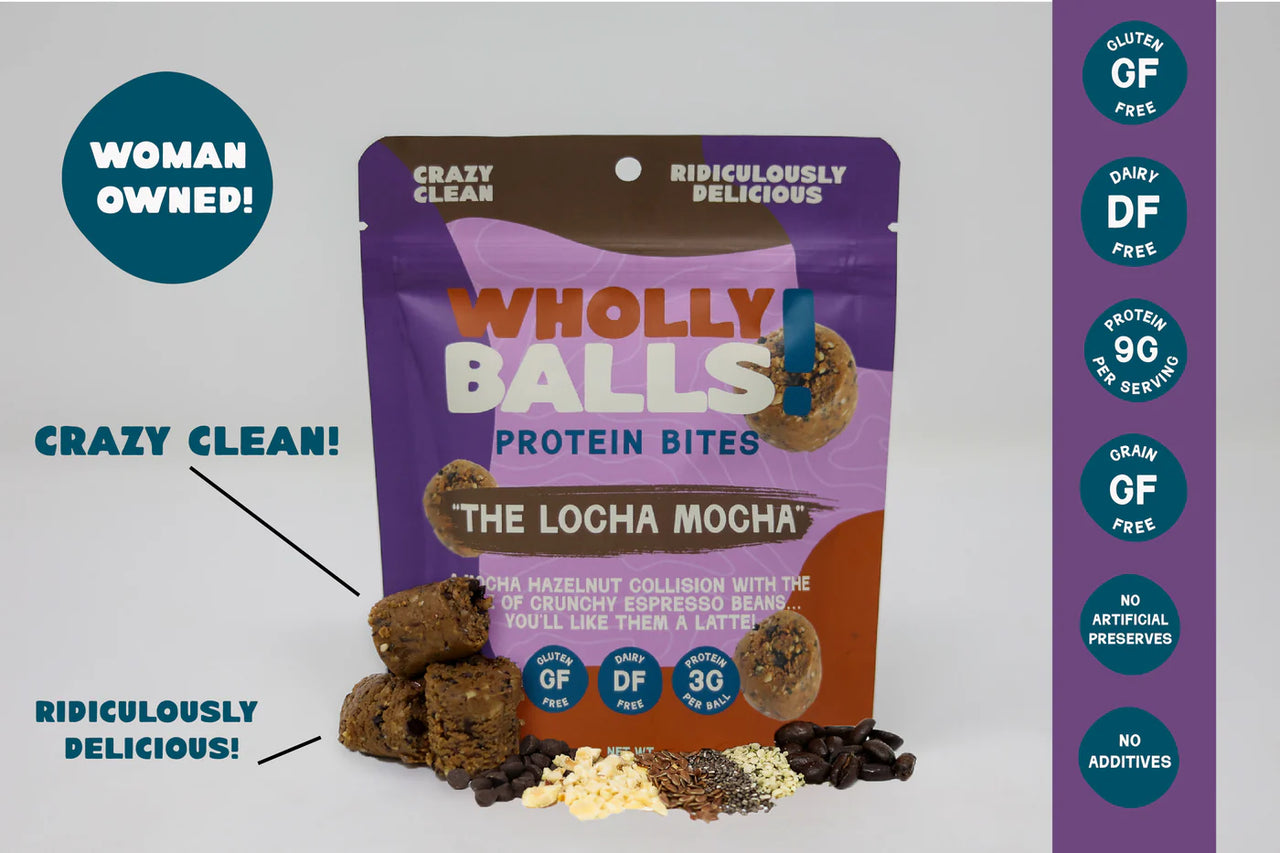 A colorful pack of The Loca Mocha – Mocha Hazelnut Espresso Wholly Balls, a plant-based protein snack, is surrounded by ingredients. Callouts highlight Woman Owned!, Crazy Clean!, Ridiculously Delicious!, with gluten-free and health icons.