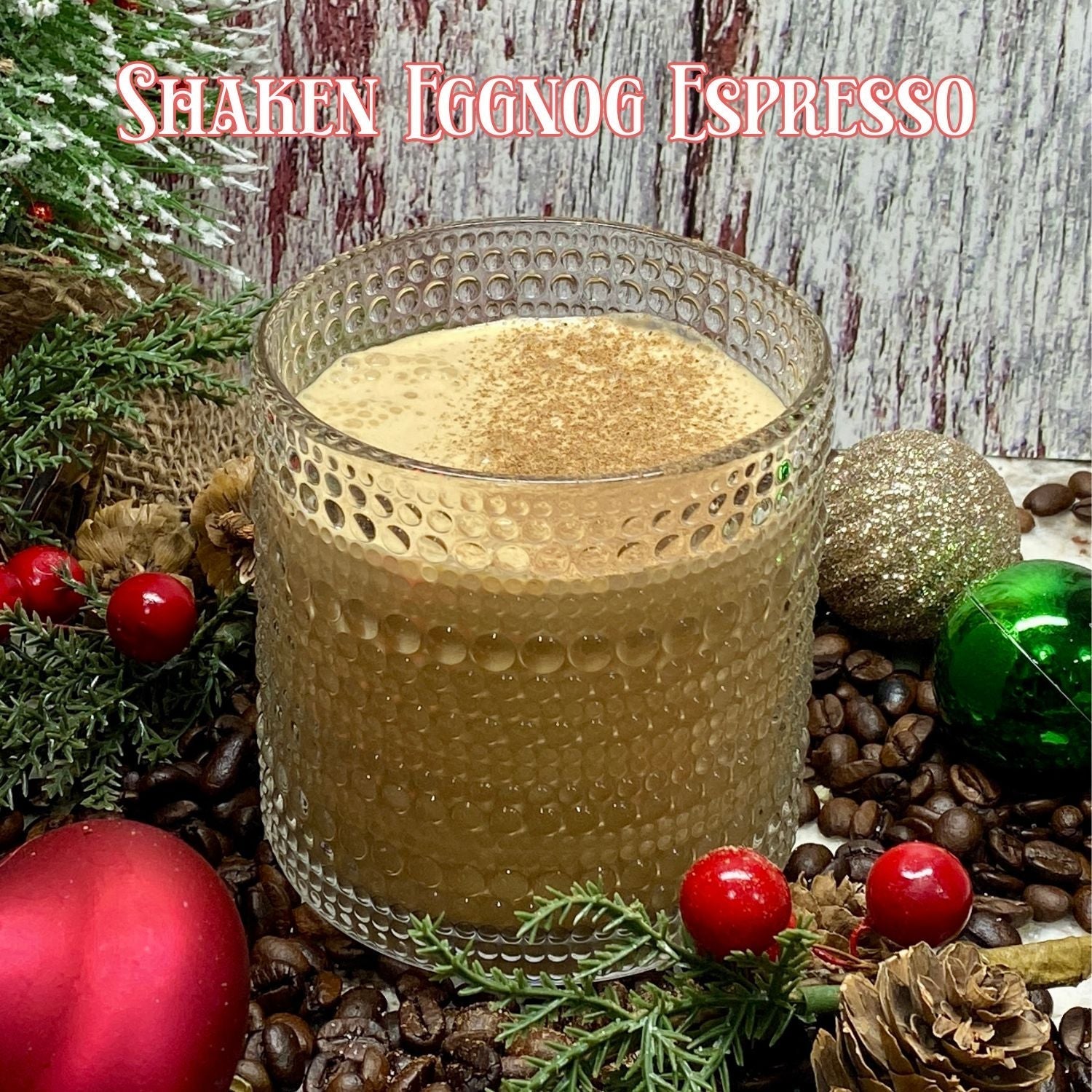 shaken eggnog espresso on a festive setting