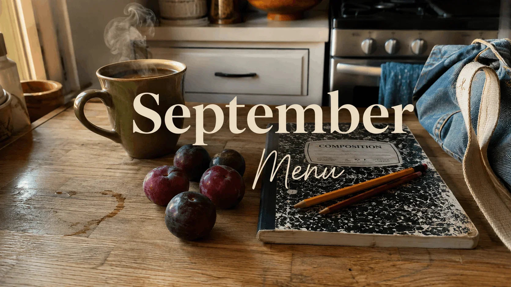 September Menu: The Class of '26 with a steaming cup of coffee and fresh plums on a wooden table.