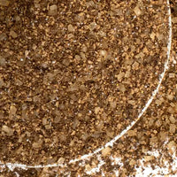 Thumbnail for Close-up of caramel espresso seasoning with a circular white line.