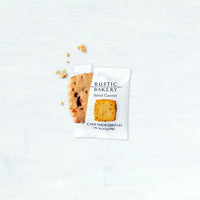 Thumbnail for A Salted Caramel Shortbread Cookie 🧈 – Buttery, Golden & Irresistibly Simple, partially unwrapped from its white packaging, rests on a light surface with a few crumbs—an inviting single-serve cookie moment.