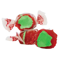 Thumbnail for Three pieces of Candy Apple Salt Water Taffy, freeze-dried for a crunchy twist, feature a red outer layer with a green center—just like a classic candied apple. Ideal for fans of nostalgic flavors and unique sweet snacks.