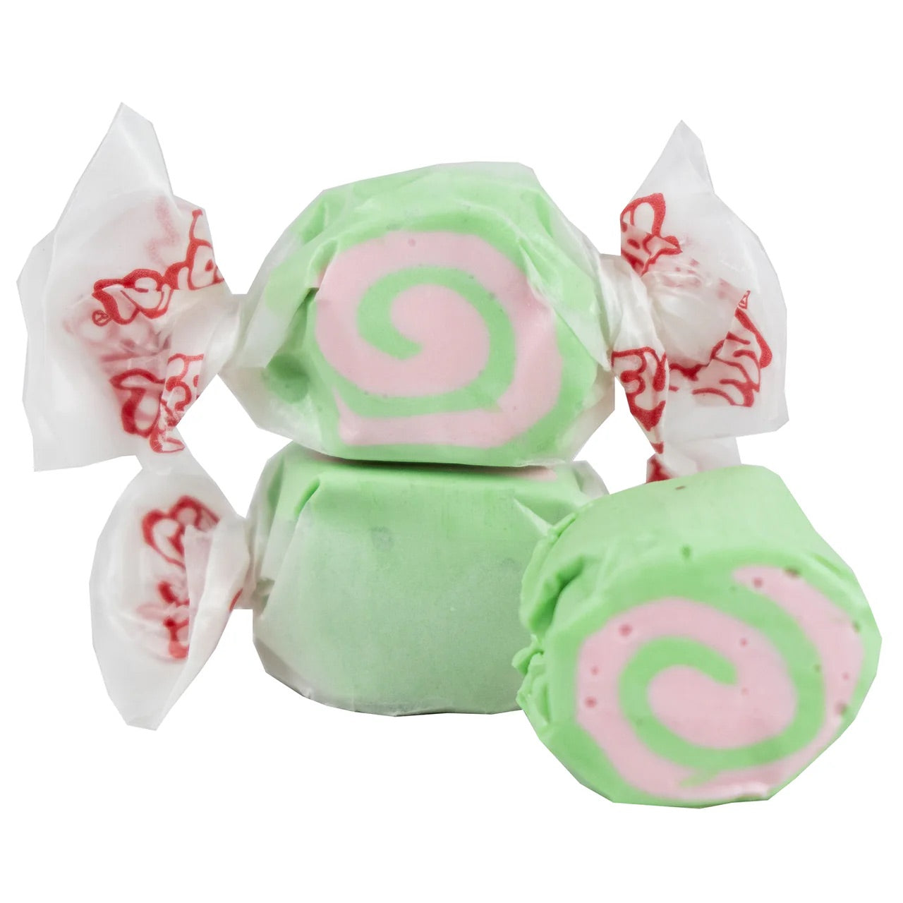 Three pieces of Cherry Limeade Salt Water Taffy—Freeze-Dried Fruity Candy with a Sweet & Tangy Crunch—two wrapped in white wax paper with red designs and one unwrapped, displaying its vibrant green and pink swirled pattern.