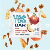 Thumbnail for The Apple Cinnamon Crisp YES Bar® – Cozy, Crunchy, Apple Pie Vibes is set on a light blue background with apple slices, cinnamon sticks, and walnuts. Its packaging features an apple image and highlights almonds and walnuts.