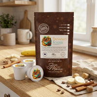 Thumbnail for Bag of Bananas Foster coffee on a kitchen counter with caramelized bananas and brown sugar props.