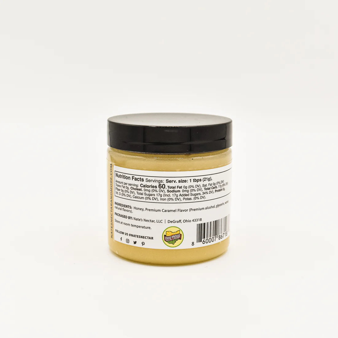 A small jar of Nate’s Nectar Caramel Creamed Honey 🍯 with a black lid is displayed against a white background. The back label shows nutrition facts, ingredients, and a barcode, though the text is partially readable.