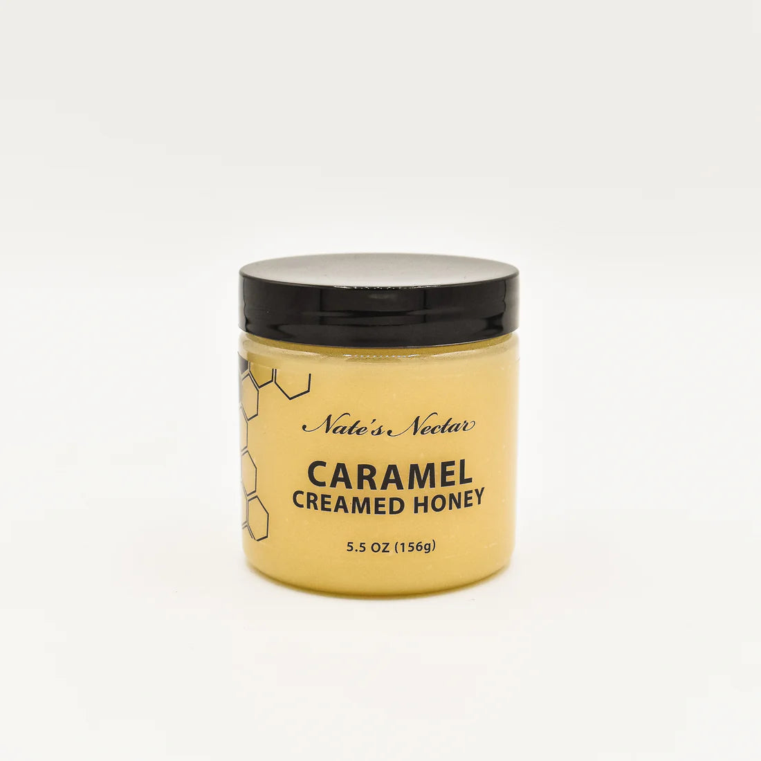 Nate’s Nectar Caramel Creamed Honey 🍯 – Sweet, Buttery Bliss in a Jar comes in a 5.5 oz (156g) jar with a black lid, yellow label, and honeycomb design, made from raw natural honey and photographed on a plain white background.