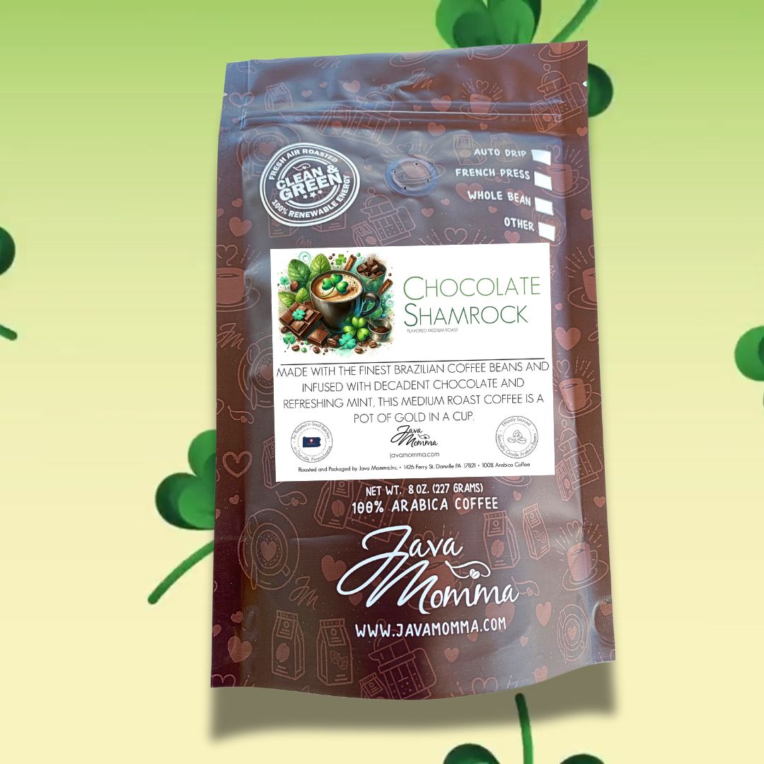 A bag of Chocolate Shamrock coffee sits in front of a St. Patrick’s Day-themed background, surrounded by shamrocks and rich chocolate elements. The packaging showcases its decadent chocolate and refreshing mint flavors.