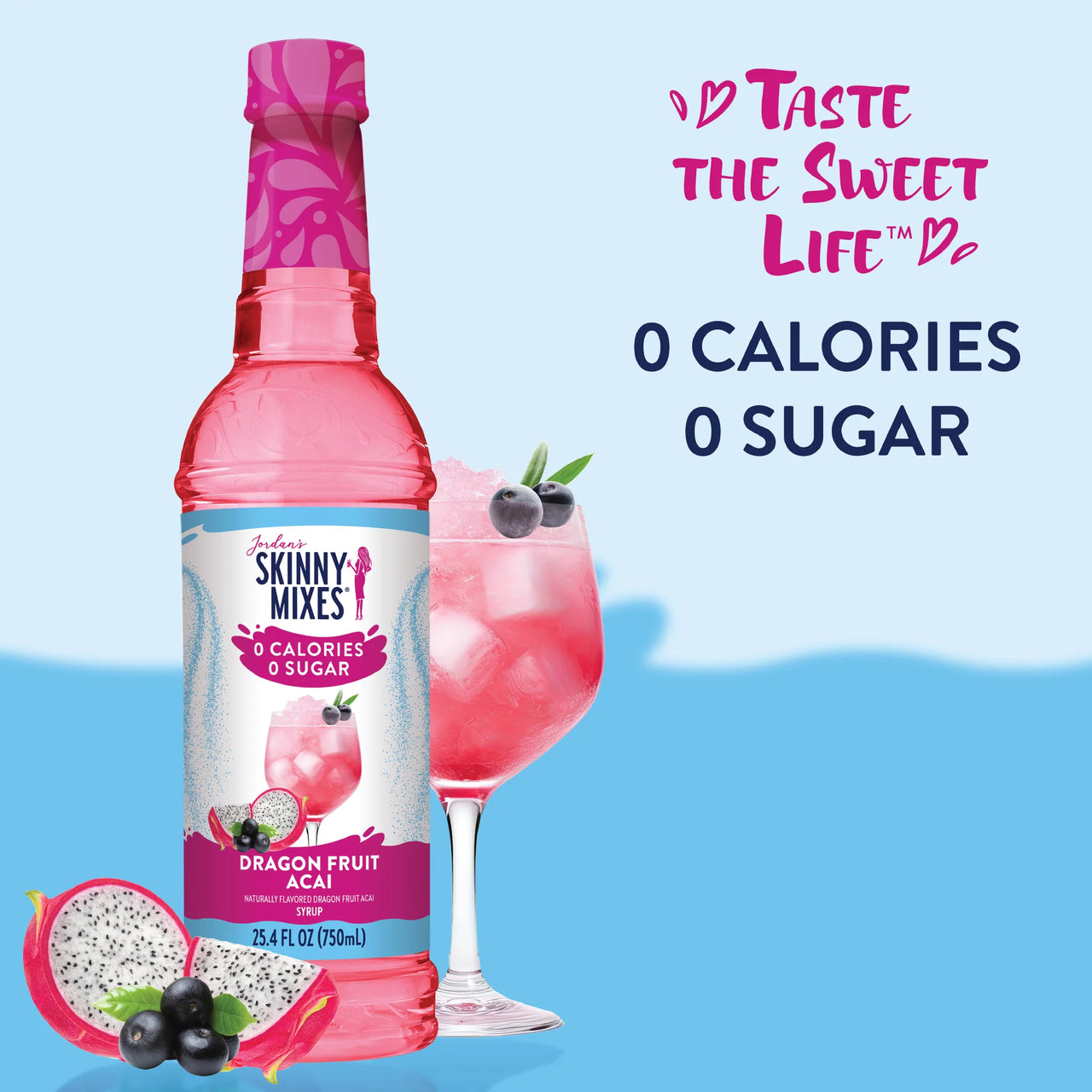 A bottle of Dragon Fruit Acai Skinny Syrup – Fruity, Flirty & Island-Ready 🐉🍇🌺 sits beside a pink iced drink with fruit garnishes. Text: “Taste the Sweet Life. 0 Calories 0 Sugar.” Fruit and leaves decorate the bottom.