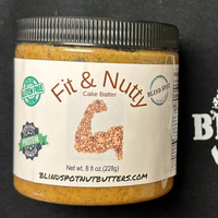 Thumbnail for A jar of Fit & Nutty – 🎂 Vanilla Cake Batter Nut Butter – Sweet Gains & Birthday Vibes, featuring a nut-arm label. It’s paleo friendly, gluten free, high protein, and part of the Blind Spot high protein nut butter range.