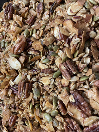 Thumbnail for Close-up of My Sister’s Granola – Nutty, Sweet, and Totally Addictive, featuring pecans, pumpkin seeds, sliced almonds, rolled oats, and toasted coconut flakes.