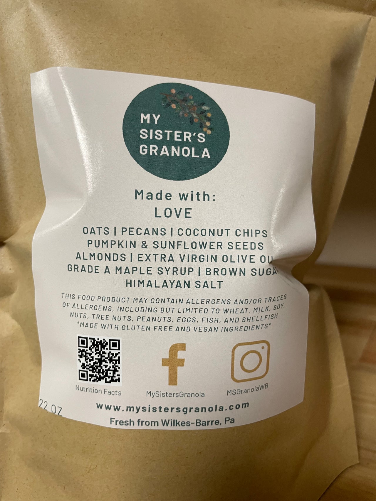 My Sister’s Granola – Nutty, Sweet, and Totally Addictive comes in brown paper packaging with social media links and QR codes. Enjoy small batch granola made with oats, pecans, toasted coconut chips, seeds, almonds, olive oil, maple syrup, brown sugar & Himalayan salt.