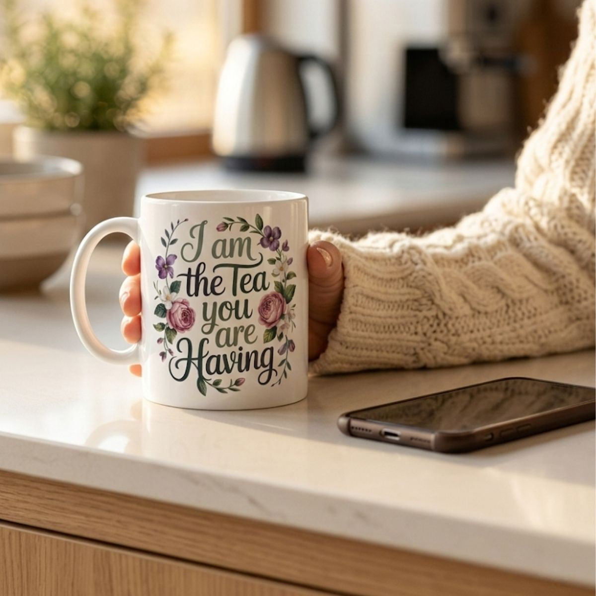 Regency drama tea mug featuring floral design with the text 'I am the Tea you are Having' on a kitchen counter.