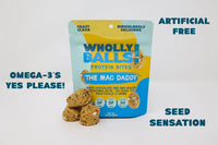 Thumbnail for A bag of The Mac Daddy – White Chocolate Macadamia Wholly Balls, a plant-based protein snack, is shown with several bites in front. It features Omega-3s, is free from artificial ingredients, and offers a unique “seed sensation.”.