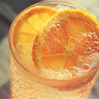 Thumbnail for A close-up of Orange Soda Skinny Syrup – Bright, Bubbly & Totally Throwback 🍊🥤✨, sugar-free with bubbles and fresh orange slices on top—a refreshing, keto-friendly treat.