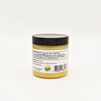 Thumbnail for A small jar of Nate’s Nectar Peach 🍑 Creamed Honey – Juicy, Sweet & Perfectly Spreadable with a black lid displays its back label, showing nutrition facts, ingredients, and a barcode against a plain white background.