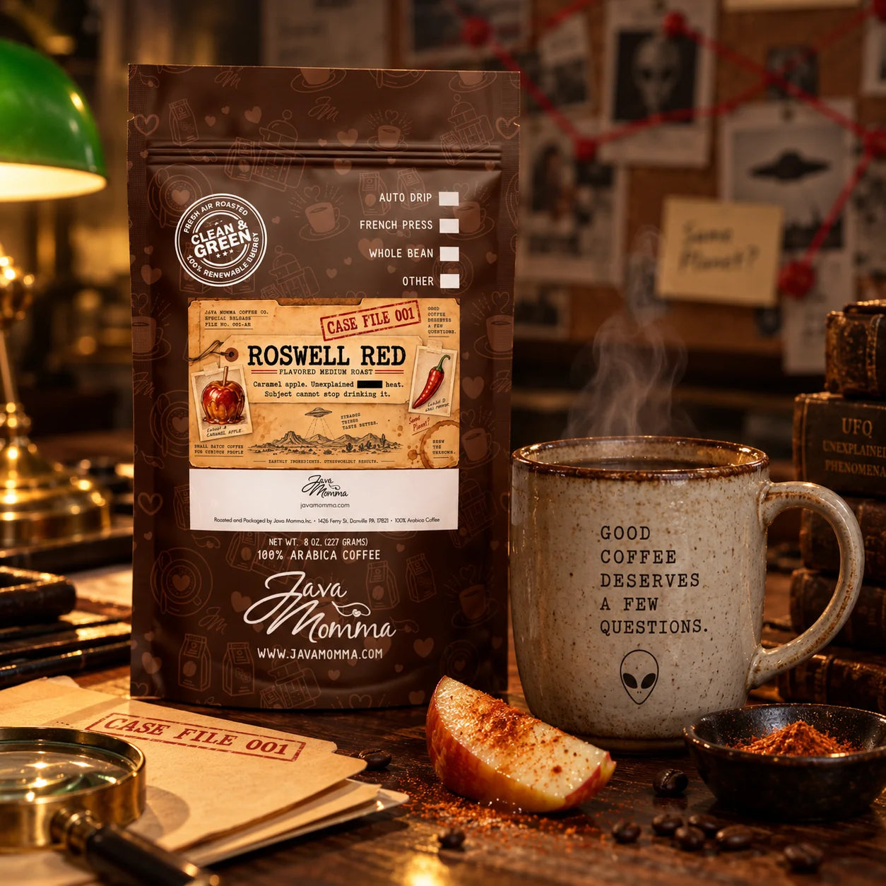 Roswell Red Coffee | Momma's Picks in a cozy setting with steaming cup and caramel apple slice.