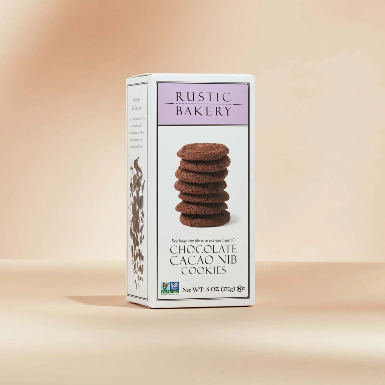 A Chocolate Cacao Nib Cookies box🍫 – Rich, Crunchy, & Full of Cocoa Love stands upright against a soft beige background, with an image of stacked cookies made with premium cocoa on its front.