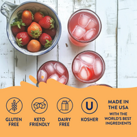 Thumbnail for Overhead view of a bowl of strawberries and three glasses of Strawberry Pink Lemonade Concentrate – Sweet, Tart, & Totally Refreshing 🍓🍋✨ on a white table. Gluten free, keto friendly, dairy free, kosher. Made in the USA with premium ingredients.