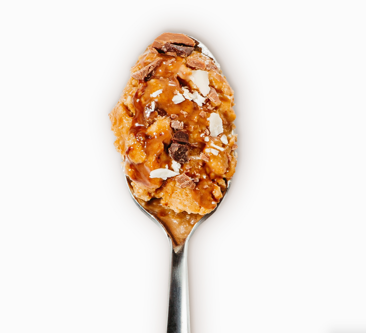 A close-up of 🍫 Bnutty Peanut Butter Cup—chocolatey, creamy peanut butter with caramel sauce and chocolate pieces—isolated on a white background.