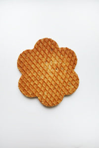 Thumbnail for A Flower-Shaped Summer Gram Original Stroopie Single – Classic Caramel – sits on a white background, showcasing its golden-brown crisscross pattern and gooey caramel center, individually wrapped for freshness.