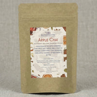 Thumbnail for Apple Chai | Year-round obsession in a loose leaf packaging surrounded by chai spices and apple pieces.