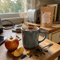 Thumbnail for Apple Chai | Year-round obsession in a steaming mug with fresh apple, spices, and a cozy kitchen setting.