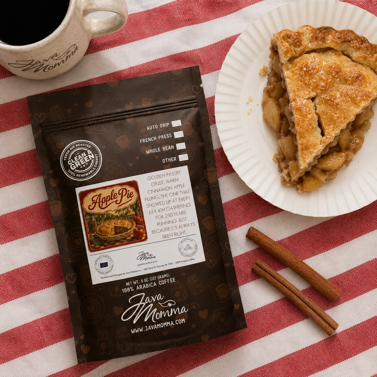Java Momma Apple Pie coffee package with a slice of apple pie on a red and white striped tablecloth.