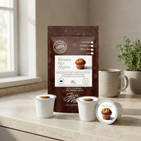 Thumbnail for Banana Nut Muffin coffee package with coffee pods on a marble surface