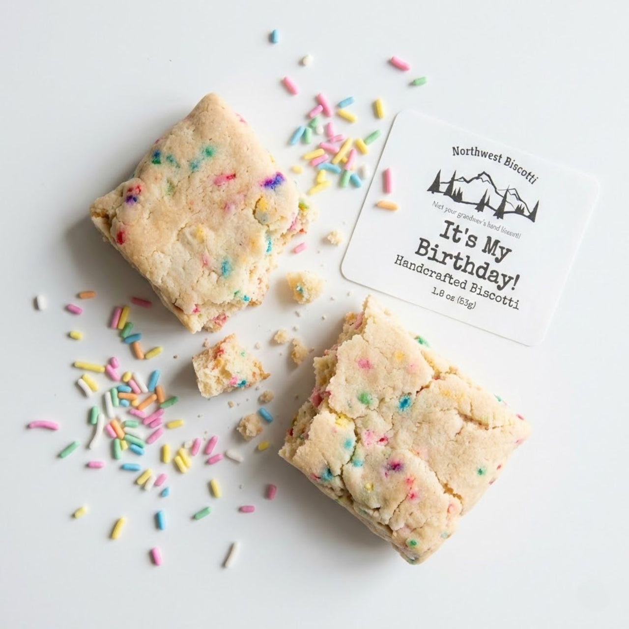 Two pieces of birthday-themed cookie bars with sprinkles and a 'It's My Birthday!' card on a white background.