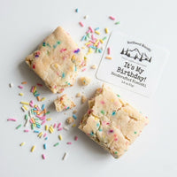 Thumbnail for Two pieces of birthday-themed cookie bars with sprinkles and a 'It's My Birthday!' card on a white background.