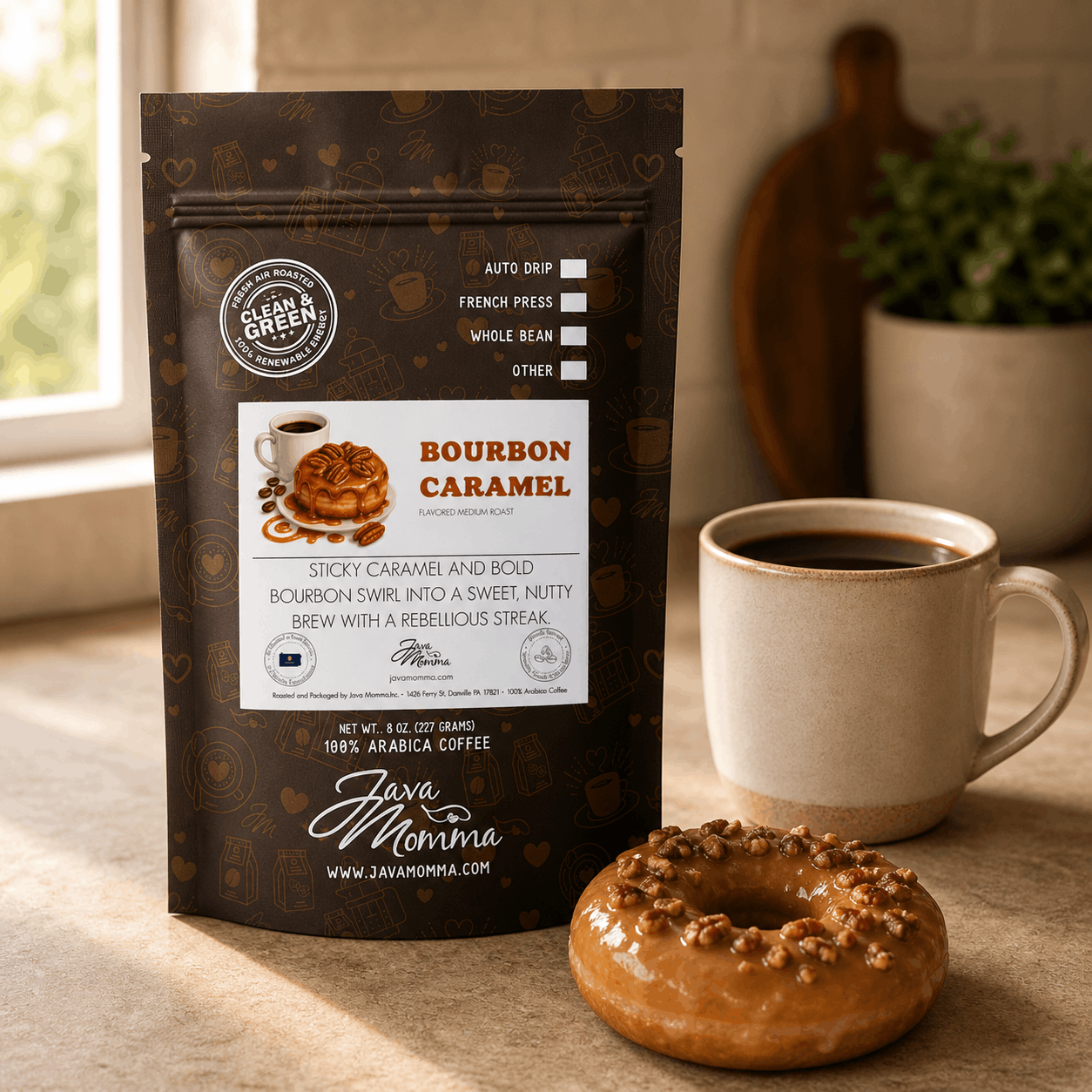 Bourbon Caramel Donut coffee bag next to a ceramic mug with a caramel glazed donut topped with pecans
