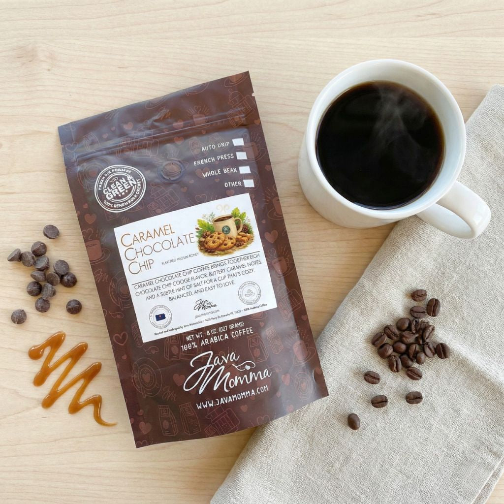 Caramel Chocolate Chip Cookie coffee bag with mug of black coffee, chocolate chips, and caramel accents