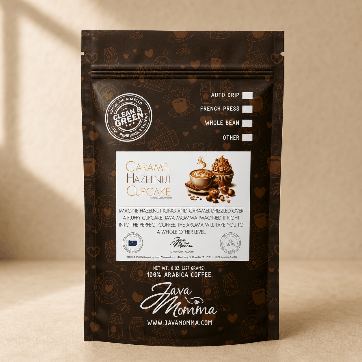 Java Momma coffee package with caramel hazelnut cupcake flavor on a beige background