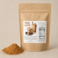 Thumbnail for A kraft paper stand-up pouch labeled CHAI LATTE stands on a beige surface with a small pile of brown powder in front. The package includes a product photo of a chai latte, nutrition facts, and usage text.