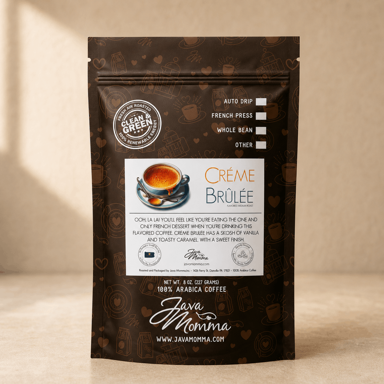 Java Momma Crème Brûlée Flavored Coffee bag on a warm neutral surface