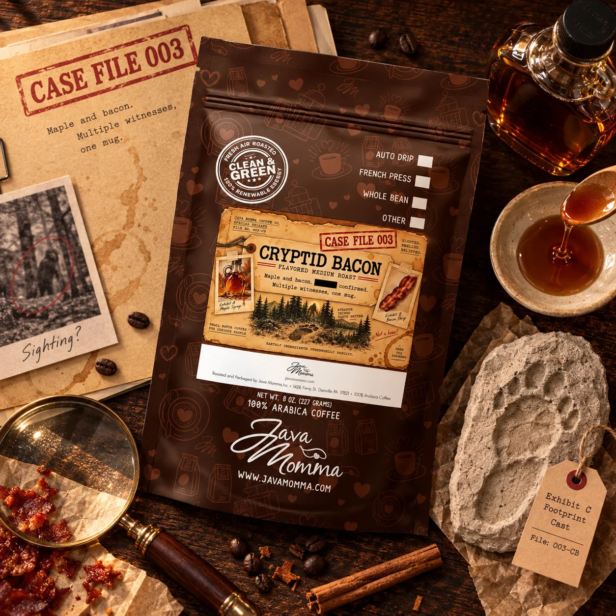 Cryptid Bacon Coffee | Momma's Picks bag with notes and coffee accessories in a rustic setting.