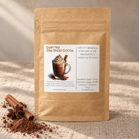 Thumbnail for Dairy Free Dark Chai Spiced Hot Cocoa Mix packaging featuring rich cocoa and chai spice ingredients.
