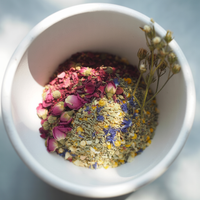 Thumbnail for A white bowl holds the 🌙 Dream Steam Facial Steamer | Botanical Blends by Java Momma—an eye-catching mix of dried flower petals and herbs, gentle for sensitive skin, with a small dried flower sprig on top.