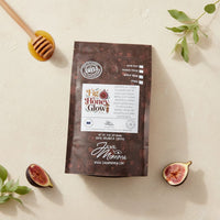 Thumbnail for Java Mamma fig & honey glow coffee package with figs and honey dipper on a light background