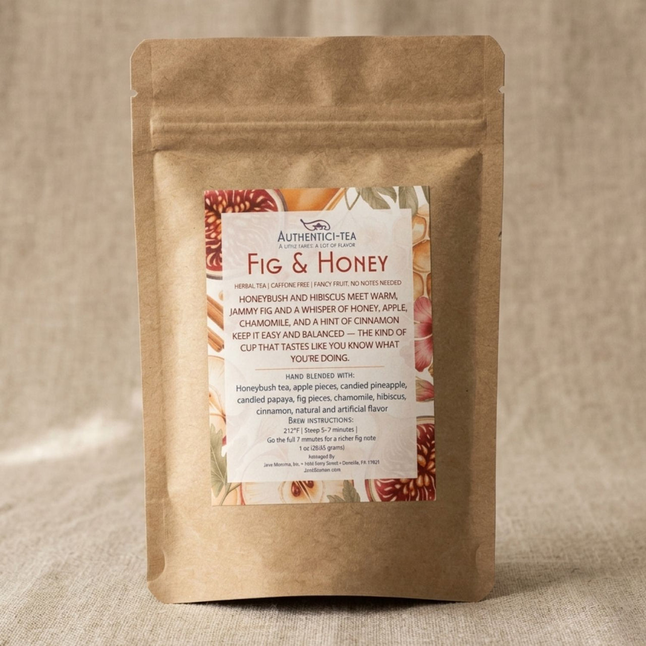 Fig & Honey loose leaf herbal tea bag from Java Momma Authentici-tea line standing upright on a warm linen surface