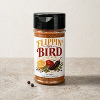 Thumbnail for Spice blend jar labeled 'Flippin' The Bird' on a neutral background