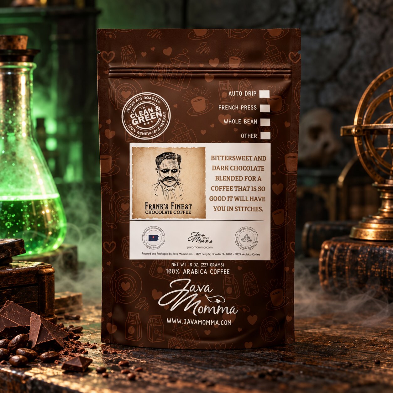 A bag of Java Momma 'Frank's Finest' chocolate coffee stands on a rustic tabletop with coffee beans, a green glass flask, and brass decorative objects in the background. The package is dark brown with white and beige label details and product text.