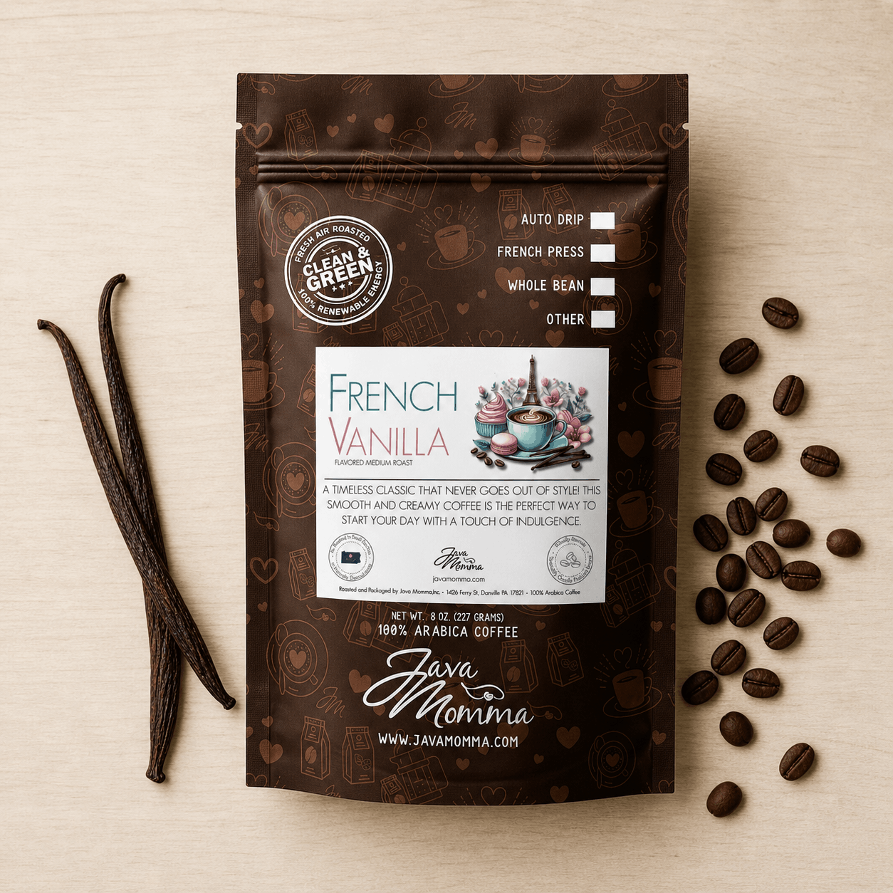 Overhead flatlay of French Vanilla coffee bag with split vanilla beans and coffee beans on warm linen