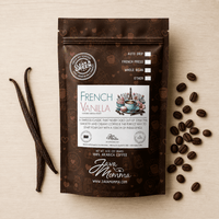 Thumbnail for Overhead flatlay of French Vanilla coffee bag with split vanilla beans and coffee beans on warm linen