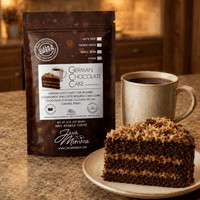 Thumbnail for Java Momma German Chocolate Cake coffee package with a slice of cake and a mug of coffee on a countertop.