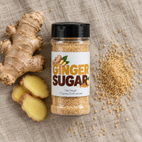 Thumbnail for Ginger Sugar Sprinkle jar with ginger roots and coarse sugar crystals on a linen background.