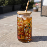 Thumbnail for Glass jar with iced tea and straw on a concrete surface outdoors